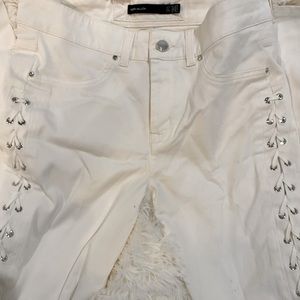 Karen Millen size 6 jeans with embellishments down sides of legs.  NEVER WORN!